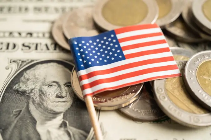 O alto valor do dólar e os requisitos para que brasileiros conquistem aberturas nos EUA, impactam diretamente na qualidade de vida | Foto: Reprodução/Canva financiamento calendário